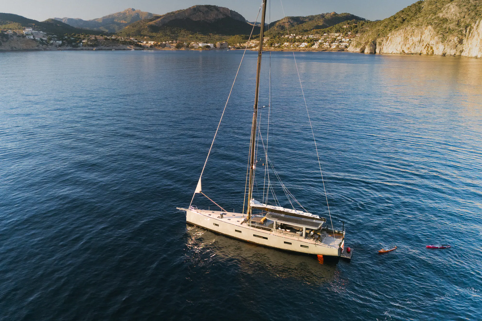 Sailing Yacht W anchored alone in a quiet Mediterranean bay